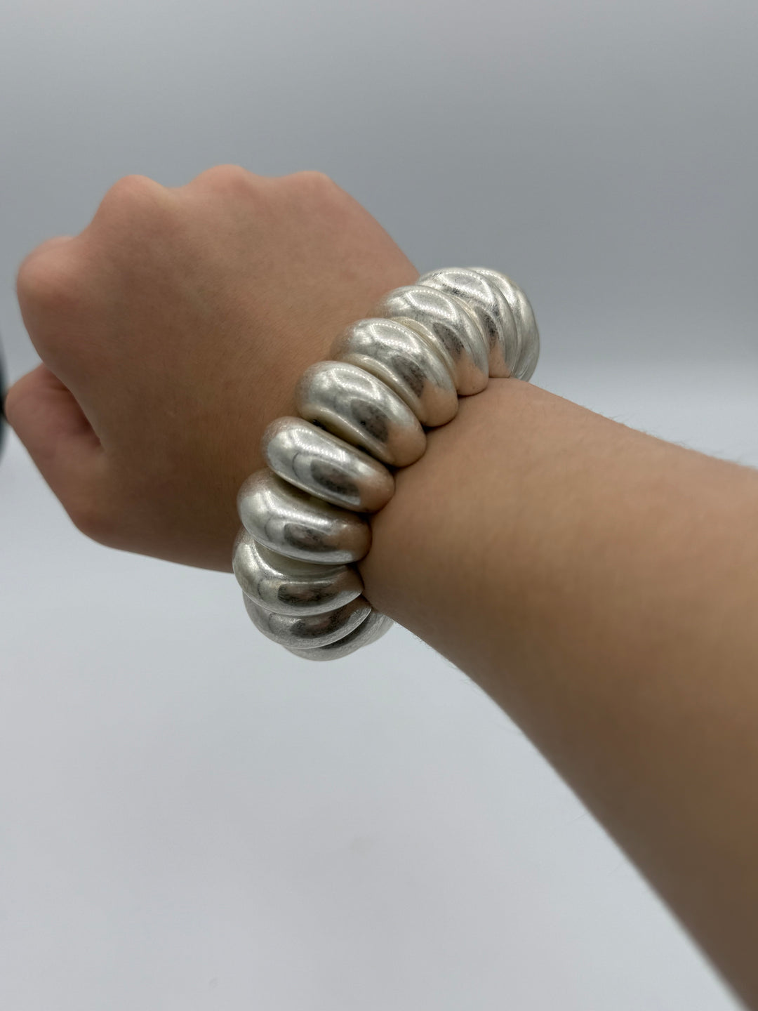 Worn Silver Metallic Long Oval Beaded Bracelet