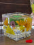Glass Candle Holder containing Dried Flowers